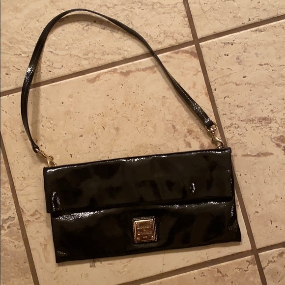 Dooney & Bourke Handbags - Patent Leather Dooney Bourke clutch purse